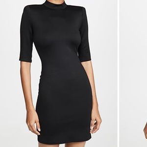 Alice Olivia inks strong shoulder mock neck dress. Perfect for warmer days. NWT